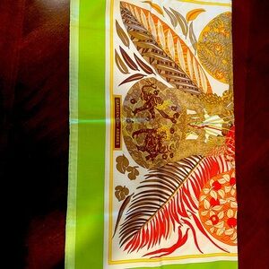 This is a HERMĒS Paris scarf. It is unused with a fully intact box